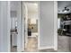 Hallway view showing access to the bedroom and bathroom, emphasizing functional layout and comfortable living spaces at 30129 N 52Nd Pl, Cave Creek, AZ 85331