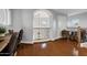 Open hallway featuring hardwood floors, staircase view, and traditional railing at 30129 N 52Nd Pl, Cave Creek, AZ 85331