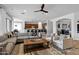 Spacious living room seamlessly connects to the kitchen, creating an open and inviting atmosphere at 30129 N 52Nd Pl, Cave Creek, AZ 85331