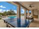 View of ping pong table and patio with outdoor dining and pool at 30129 N 52Nd Pl, Cave Creek, AZ 85331