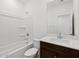 Bathroom featuring a vanity with a sink, toilet and shower/tub combination at 37126 W Prado St, Maricopa, AZ 85138