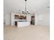 Open-concept living area and kitchen, perfect for entertaining at 37126 W Prado St, Maricopa, AZ 85138
