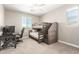 Bright bedroom featuring a bunk bed, desk, and chair providing a versatile space for work or play at 3751 E Zachary Dr, Phoenix, AZ 85050