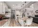 Modern kitchen with stainless steel appliances, granite countertops, an island, and bar seating at 3751 E Zachary Dr, Phoenix, AZ 85050