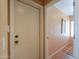 Hallway featuring a closet, ceramic tile floors, and access to other rooms at 426 N Santiago Trl, Casa Grande, AZ 85194