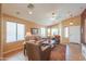 Bright living room featuring large windows, comfortable seating, and recessed lighting at 426 N Santiago Trl, Casa Grande, AZ 85194