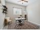 Bright bedroom featuring a ceiling fan, decorative shelves, and a neutral color scheme at 460 W Glacier Bay Dr, San Tan Valley, AZ 85140