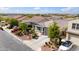 Beautifully landscaped home with a well-manicured lawn, a paved driveway, and an attached garage at 460 W Glacier Bay Dr, San Tan Valley, AZ 85140
