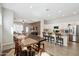 Open floor plan seamlessly connects the kitchen, dining, and living areas, perfect for entertaining at 460 W Glacier Bay Dr, San Tan Valley, AZ 85140