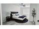Bright bedroom with a ceiling fan and an accent rug, creating a cozy and inviting space at 5007 N 71St Dr, Glendale, AZ 85303