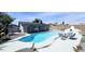 Backyard pool features a refreshing pool, outdoor seating area, a stucco fireplace and low maintenance yard at 5007 N 71St Dr, Glendale, AZ 85303
