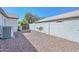 A gravel backyard with a view of mountains and a utility box at 5226 W Pontiac Dr, Glendale, AZ 85308
