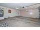 Spacious garage with plenty of room for storage and cabinets at 5226 W Pontiac Dr, Glendale, AZ 85308