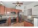 Kitchen with stainless steel appliances, granite countertops, and a decorative backsplash at 5226 W Pontiac Dr, Glendale, AZ 85308