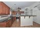 Kitchen featuring granite countertops, stainless steel appliances, and tile backsplash at 5226 W Pontiac Dr, Glendale, AZ 85308
