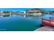 Picturesque water view with a dock and a mountain in the background at 5226 W Pontiac Dr, Glendale, AZ 85308