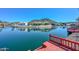 Beautiful view of the canal featuring neighboring homes and gorgeous Arizona mountain views at 5226 W Pontiac Dr, Glendale, AZ 85308