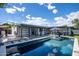 Stunning backyard pool with lounge chairs, covered patio, and well-maintained landscaping at 5809 N 10Th Pl, Phoenix, AZ 85014