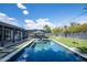 Large backyard pool with a lawn and covered patio, perfect for entertaining at 5809 N 10Th Pl, Phoenix, AZ 85014