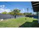Lush backyard offers a generous lawn with space for recreation, near a dark block wall at 5809 N 10Th Pl, Phoenix, AZ 85014