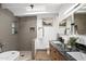 Elegant bathroom features a freestanding tub, walk-in shower, and a stylish vanity at 5809 N 10Th Pl, Phoenix, AZ 85014