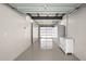 Bright garage with glass door and storage cabinets for organization at 5809 N 10Th Pl, Phoenix, AZ 85014