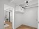 Hallway with hardwood floors and a view to a bedroom at 5809 N 10Th Pl, Phoenix, AZ 85014