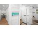 Laundry room with a washer, dryer, and functional storage solutions at 5809 N 10Th Pl, Phoenix, AZ 85014