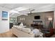 Open-concept living room with wood wall, modern furniture, and a view of the dining area at 5809 N 10Th Pl, Phoenix, AZ 85014