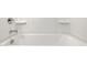 Close-up of a pristine white bathtub and shower combination at 5824 E Axle Ln, San Tan Valley, AZ 85140