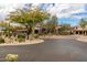 Arizona clubhouse with desert landscaping and trees at 6094 E Evening Glow Dr, Scottsdale, AZ 85266