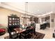 Open-concept space blending the dining area with a contemporary kitchen and luxurious decor at 6094 E Evening Glow Dr, Scottsdale, AZ 85266