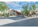 An entrance to a clubhouse with desert landscaping at 6094 E Evening Glow Dr, Scottsdale, AZ 85266