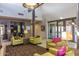 A modern lobby with high ceilings, comfortable seating and a decorative lighting fixture at 6094 E Evening Glow Dr, Scottsdale, AZ 85266