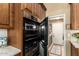 Gourmet kitchen featuring a built-in oven with stainless steel accents and ample storage at 6094 E Evening Glow Dr, Scottsdale, AZ 85266