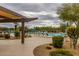 Resort style pool with lounge chairs and shade at 6094 E Evening Glow Dr, Scottsdale, AZ 85266