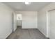 Bright and airy bedroom with soft carpet, a view to the hall, and ample natural light at 6602 S 23Rd Ave, Phoenix, AZ 85041