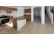 The kitchen boasts an island, stainless appliances, and lots of cabinet space, perfect for cooking and entertaining at 6602 S 23Rd Ave, Phoenix, AZ 85041