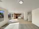 Open living area connects seamlessly to the kitchen, creating a warm and inviting space for gatherings and everyday living at 6602 S 23Rd Ave, Phoenix, AZ 85041