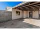 Covered back patio offering shade and outdoor space, perfect for relaxation at 6823 W Coolidge St, Phoenix, AZ 85033