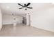 Bright, open floor plan with neutral tile and an easy flow into the kitchen at 6823 W Coolidge St, Phoenix, AZ 85033
