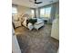 Cozy bedroom featuring a comfortable bed, soft carpet, and an abundance of natural light at 905 S 108Th Ave, Avondale, AZ 85323