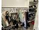 Organized walk-in closet with ample storage for clothing, shoes, and accessories at 905 S 108Th Ave, Avondale, AZ 85323