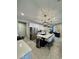 Modern kitchen with white cabinets, quartz countertops, and stainless appliances at 905 S 108Th Ave, Avondale, AZ 85323