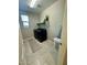 Functional laundry room with modern appliances, shelving, and ample space at 905 S 108Th Ave, Avondale, AZ 85323