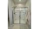 Contemporary shower with a glass enclosure, offering a luxurious bathing experience at 905 S 108Th Ave, Avondale, AZ 85323