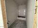 Unfinished bathroom with a shower/tub installed at 9543 W Parkway Dr, Tolleson, AZ 85353
