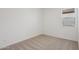 Cozy bedroom with neutral carpet and a single window at 9543 W Parkway Dr, Tolleson, AZ 85353