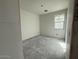 Unfinished bedroom with smooth flooring and a sunlit window at 9543 W Parkway Dr, Tolleson, AZ 85353
