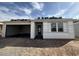 New home construction showing the front of the house, garage, and roof being installed at 9543 W Parkway Dr, Tolleson, AZ 85353